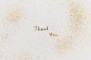 Phrase Thank you avec des paillettes.